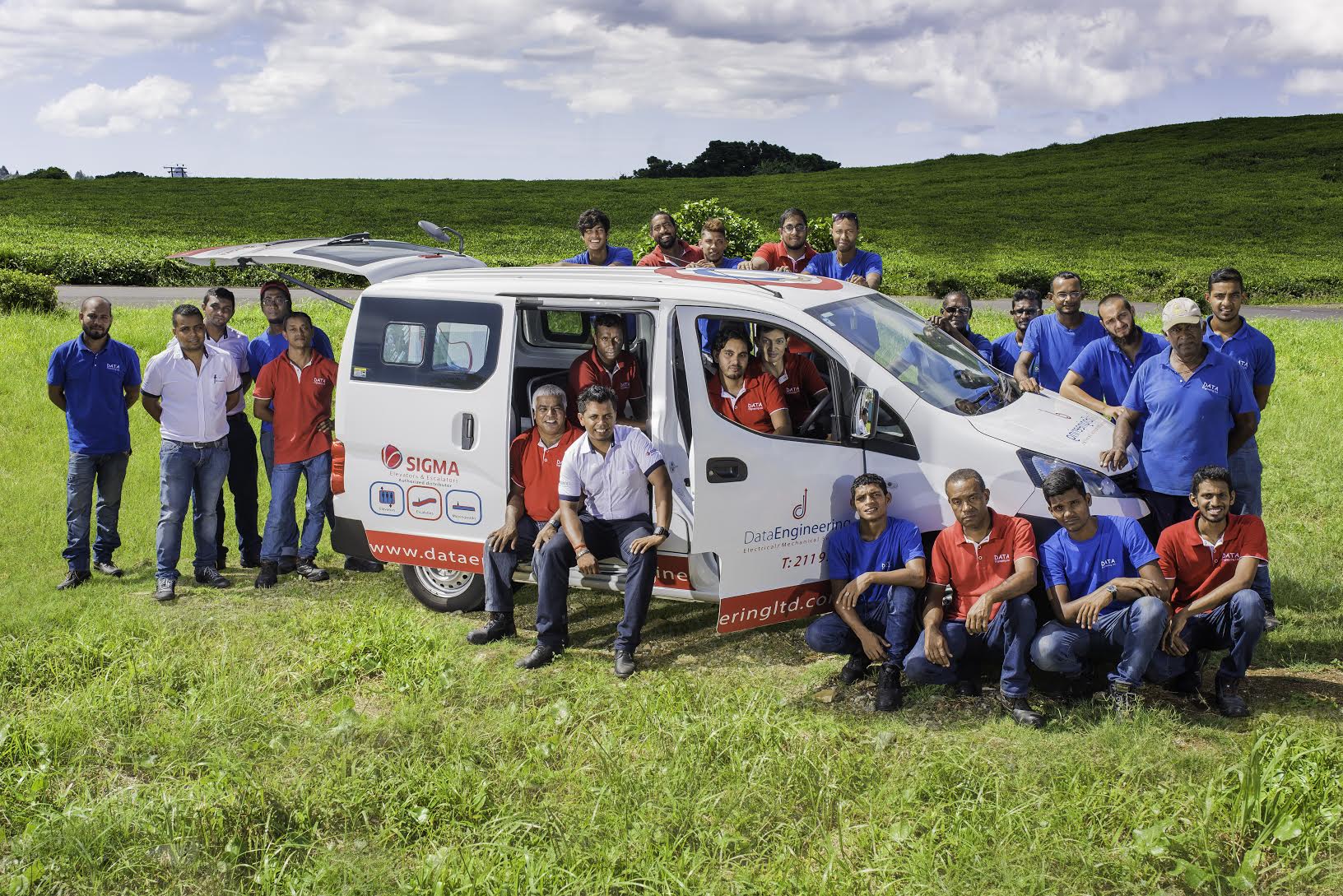 Data Engineering | Lifts, Elevators and Travelators Team Photo with vehicle